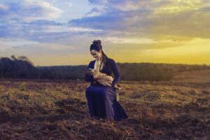 mother-and-child-woman-and-child-breastfeed-field